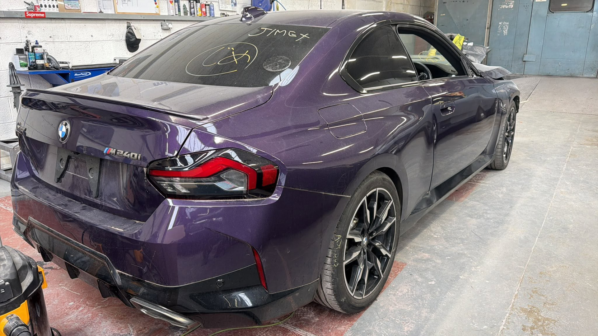 Purple BMW at the Mayfs workshop